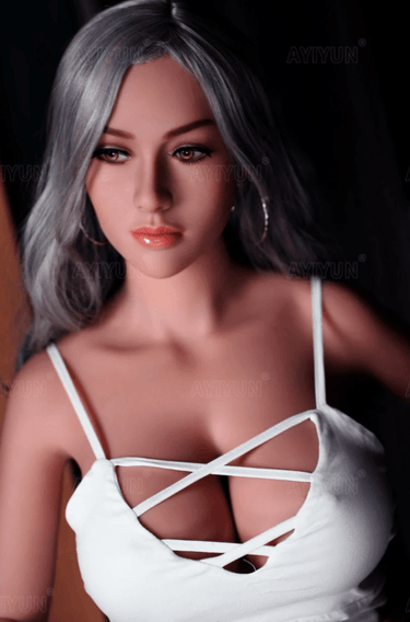 a close up of a mannequin wearing a white top